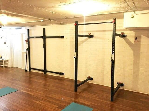 Image of FOLD BACK WALL MOUNTED RIG SQUAT POWER RACK - sweatcentral